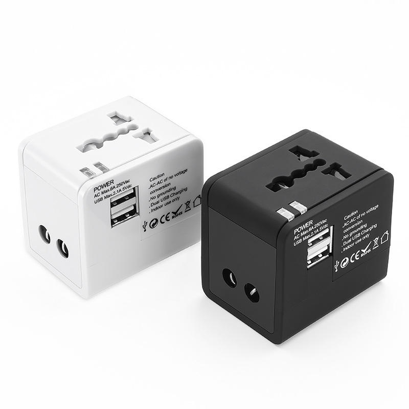 Universalus kelioninis adapteris su dviem USB prievadais